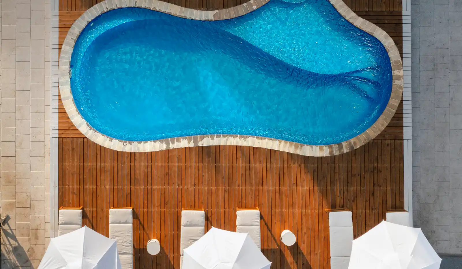 choosing the right pool color: your complete guide to stunning backyard design in 2025